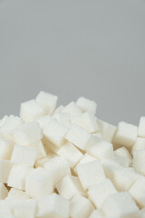 Cubes of white crystalline beetroot refined sugar.