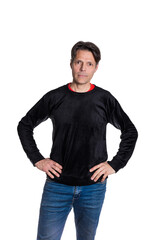 Fototapeta premium Middle-aged man looking at the camera, on white background, wearing casual clothes.