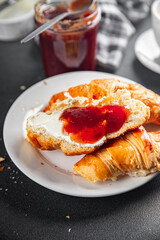 Croissant with jam French toast fresh tasty food dish Delicious gourmet food background on the table rustic food top view copy space