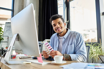 Creative professional reviewing color samples while smiling in a bright workspace