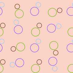 Seamless pattern with pastel colored rings on pink