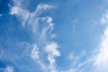 white clouds floating on blue sky in beautiful morning.