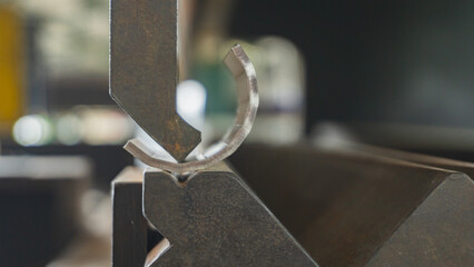 Metal stainless sheet bending on hydraulic machine.  bending stainless sheet. 