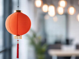 Obraz premium vibrant red lantern adds festive touch to modern office space