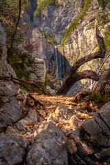 Obraz premium The incredible waterfall Boka in the wild nature and beauty of the famous Triglav National Park in Slovenia.