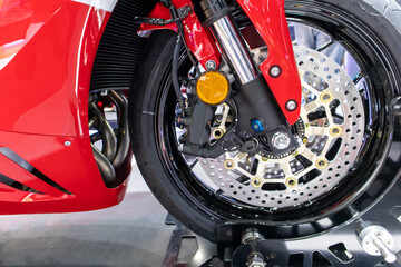 Disc brakes on a motorcycle up close alloy wheels for motorcycles robust steel wheel arches. Tires and wheels for motorcycles in chrome. ABS on motorbikes and disc brakes are safety devices.