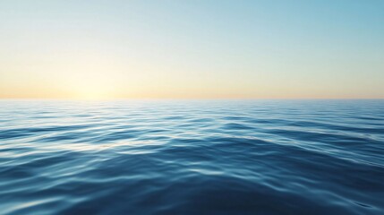 Fototapeta premium Calm ocean reflecting golden sunset light at dawn