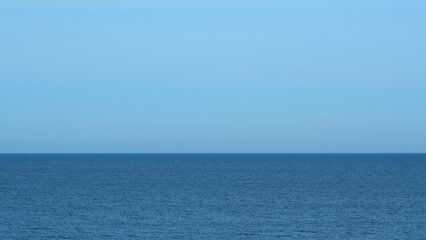 Clear Blue Waves. Waves Of The Sea On A Clear Day With Blue Sky. View Open Sea Background. Real time.