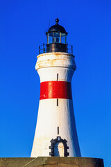 Lighthouse at the Fraserburgh harbour in Scotland