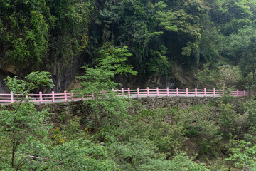 Fototapeta premium The guardrail of Yaojiagou Cherry Blossom Valley Highway, Pengzhou, Sichuan, China