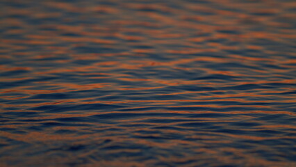 Beautiful Background Of Light Reflection Water. Copy Space. Golden Sunlight Over Sea Or Ocean. Real time.