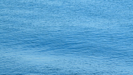 Blue Calm Sea. Blue Water Reflection. Flowing Water Surface. Still.