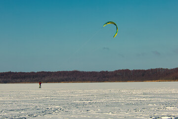 kite surfing in the snow Eis - Winter - Schnee - Segel - Sport - Lake - See - Landscape - Background - Ice