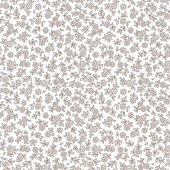 Beautiful floral pattern in small flowers. Small hand drawn outline brown daisy flowers. Ivory background. Liberty print. Floral seamless background. Ditsy template for fashion prints. Stock pattern.