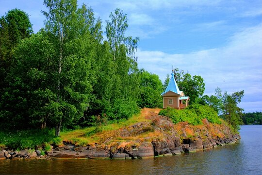 A lonely Orthodox chapel in a forest on the shores of Lake Ladoga on the island of Valaam.