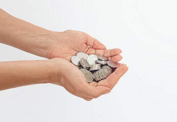 Female palms showing pile of coins. White background. Concept of poverty, economic crisis, inflation.