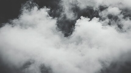 Obraz premium Abstract Smoke: A mesmerizing dance of ethereal gray and white, swirling in enigmatic shapes against a dark backdrop. A captivating study in texture and form.