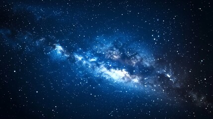 A stunning view of a spiral galaxy filled with bright stars and cosmic dust in shades of blue and white.