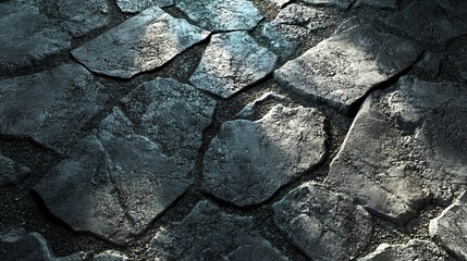 Fototapeta premium Sunlight filtering through the cracks of a stone pavement