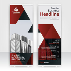 Modern design of annual report display stands showcasing professional graphics in an office environment with red color