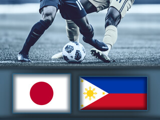 Japan and Philippines flag on scoreboard,against football players during a match on soccer field.