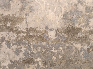 Grunge Rough Peeled Texture of old concrete wall.Concrete wall of light grey color cement texture background.Grey pastel rough crack cement texture stone concrete,rock plastered stucco wall.