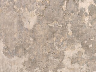 Grunge Rough Peeled Texture of old concrete wall.Concrete wall of light grey color cement texture background.Grey pastel rough crack cement texture stone concrete,rock plastered stucco wall.