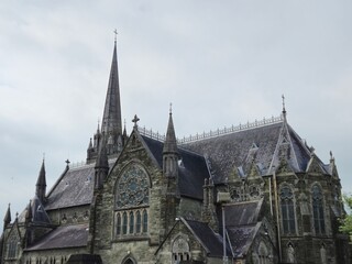 Medieval Architecture with Sky and Clouds Behind a Building Facade © Studio-M