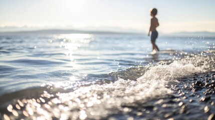 A Child Playfully Exploring the Gentle Waves of Clear Water Along the Shore Under Bright Daylight, Capturing the Joy of Nature and Childhood Innocence