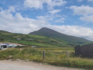 Mountain Landscape with Cumulus Clouds and Grassland © Studio-M