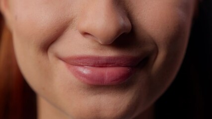 Close up sensitive lips balm lipstick Caucasian unrecognizable unknown girl female woman client in clinic home smiling kiss smile kissing plastic surgery fillers wrinkles smoothing beauty injection - Powered by Adobe