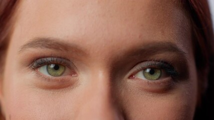 Close up half face Caucasian businesswoman girl female business woman lady client in office clinic hospital home indoors open eyes looking at camera health medicine eyes vision eyesight eyestrain look