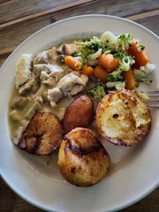 Potato and salad dish on a table