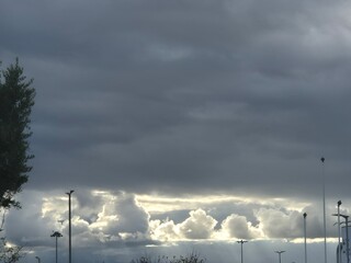White cumulus clouds in the stormy sky