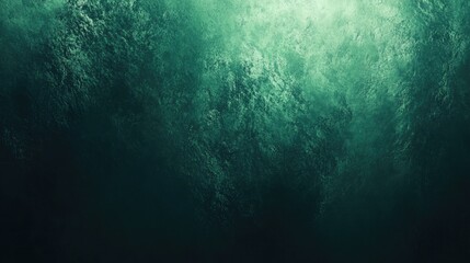 Fototapeta premium A textured abstract background in deep emerald green tones, evoking a sense of calm and mystery.