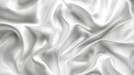 Obraz premium Luxurious white silk fabric with flowing, elegant folds and rich texture.
