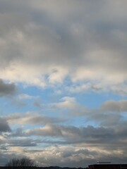 Obraz premium Thundery Stormy Cloudy Blue and Grey Skyscape Sky with large Clouds