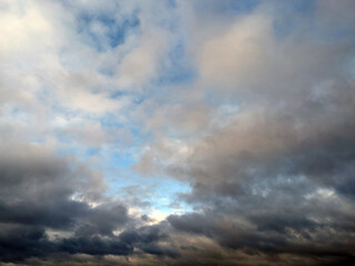 Obraz premium Thundery Stormy Cloudy Blue and Grey Skyscape Sky with large Clouds