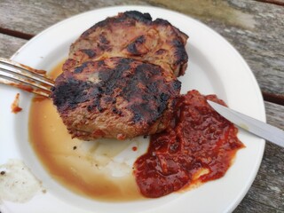 Steak preparation close view, meat dish