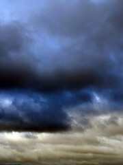 Obraz premium Thundery Stormy Cloudy Blue and Grey Skyscape Sky with large Clouds