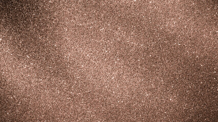 Glitter texture in Mocha Mousse color of the year 2025 creates simple background for creative...