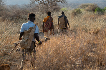 Three Hadzabe Hunters in Tanzania 