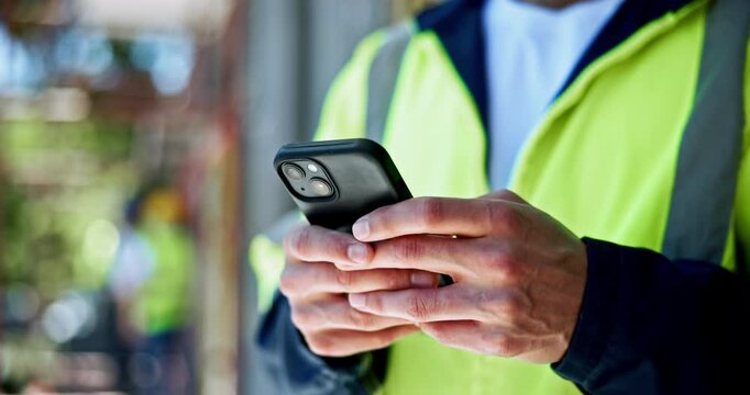 Man, engineer and hands typing with mobile for planning construction project, infrastructure and site development. Architect, phone and builder outdoor for communication, message and schedule closeup