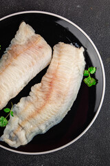 Raw fish fillet fresh tasty food dish delicious gourmet food background on the table rustic food top view copy space keto and paleo diet pescetarian