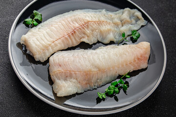 Raw fish fillet fresh tasty food dish delicious gourmet food background on the table rustic food top view copy space keto and paleo diet pescetarian