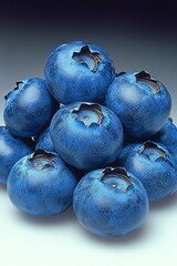 Obraz premium Pile of Fresh, Ripe Blueberries on a Dark Background Antioxidants and Healthy Eating