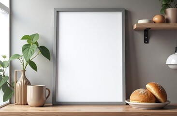 A stylish kitchen shelf displays a blank framed picture alongside a potted green plant, a ceramic...
