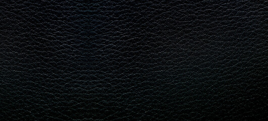 Close-up macro of black synthetic leather texture,Close up of synthetic leather textured background © banjongseal324