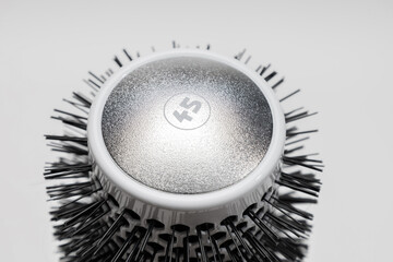 cylindrical aluminum hair styling brush. brush size 45  close up