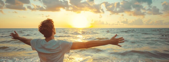 Sunset Serenity: A Man Embraces the Golden Hour by the Ocean